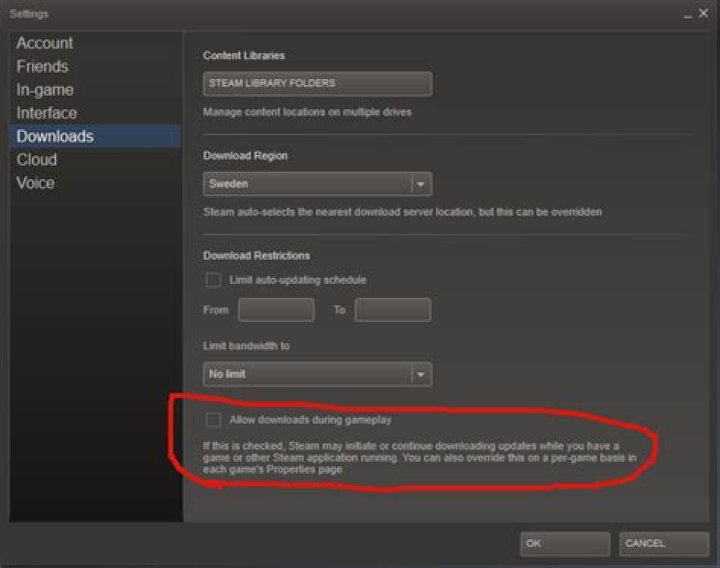 How do I continue downloading a game in Steam while playing?