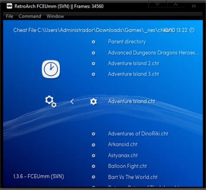 How do I enable a cheat file in RetroArch?