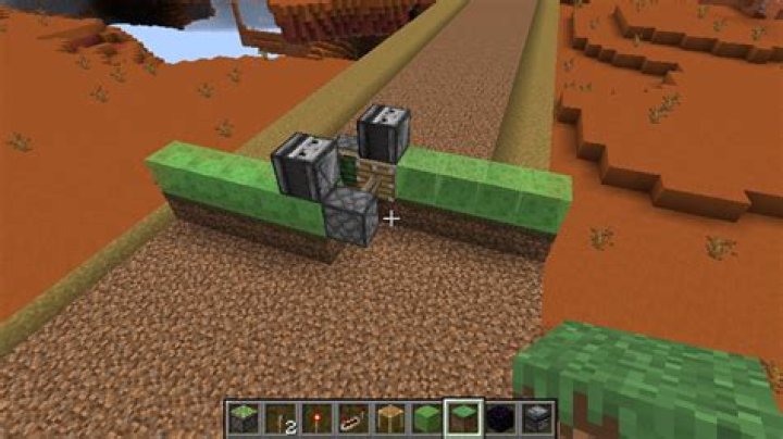 Is possible to revert a Grass Path to a Grass Block without removing it?