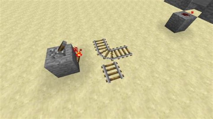 Minecraft, reverse default of rail switch w/ button